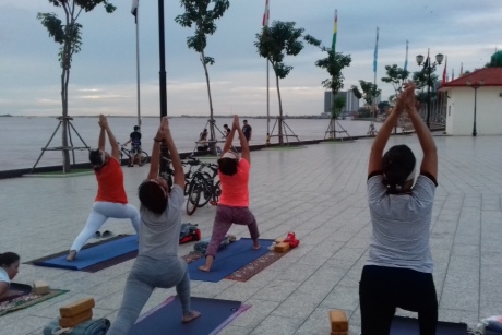 Morning yoga on the waterfront